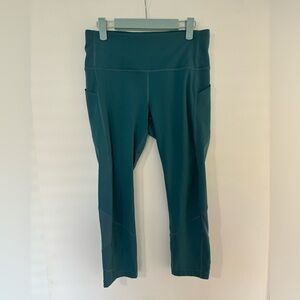 Lululemon cropped teal leggings. Size 8.